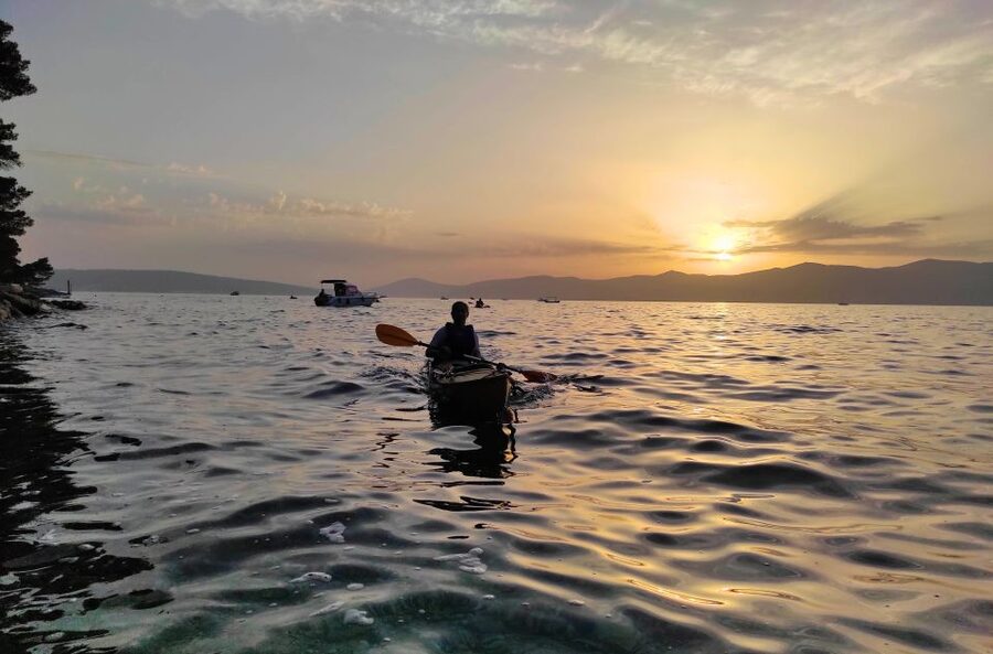 Split: Guided Sunset Sea Kayaking & Snorkeling Tour - Sunset behind the mountains
