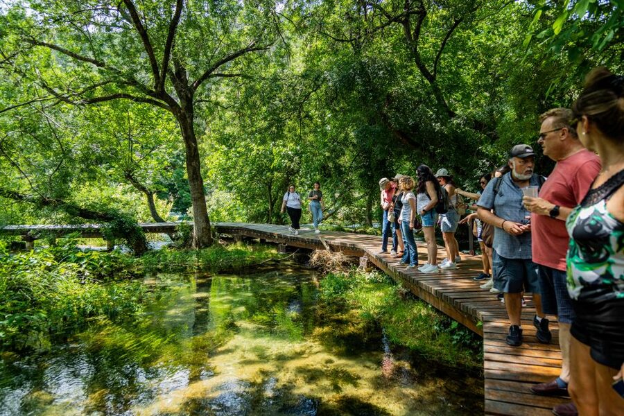 Split: Krka National Park Day Trip with Boat Ride & Swimming - Walking Krka’s wooden trails