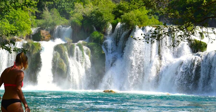 Split: Krka Waterfalls Guided Day Trip with Swim & Boat Tour - Walking through Krka National Park