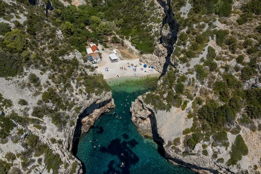 Split or Trogir: Blue Cave, Vis, and Hvar Speedboat Tour - Stiniva Cove offers a quick scenic pause