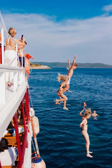 Split: Sunset Boat Party with Live DJs and Blue Lagoon Swim - Drvenik Veli and the golden-hour ride back