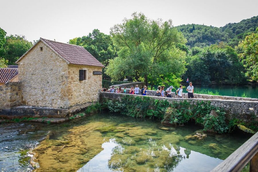 Split/Trogir: Krka National Park Day Trip & Boat to Skradin - Old stone houses, watermills, and a lesson in village life