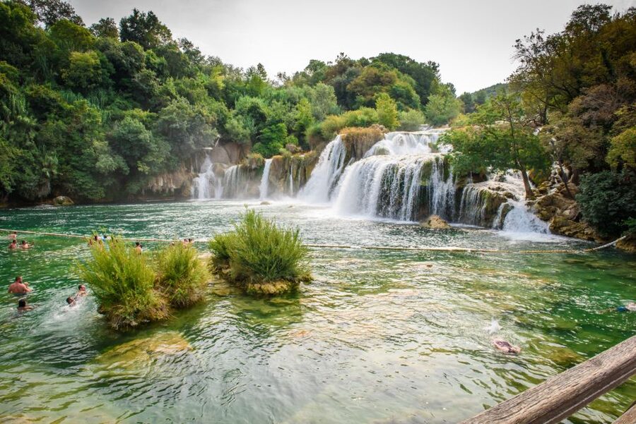 Split/Trogir: Krka National Park Day Trip with Wine Tasting - Local wine tasting in a Dalmatian konoba