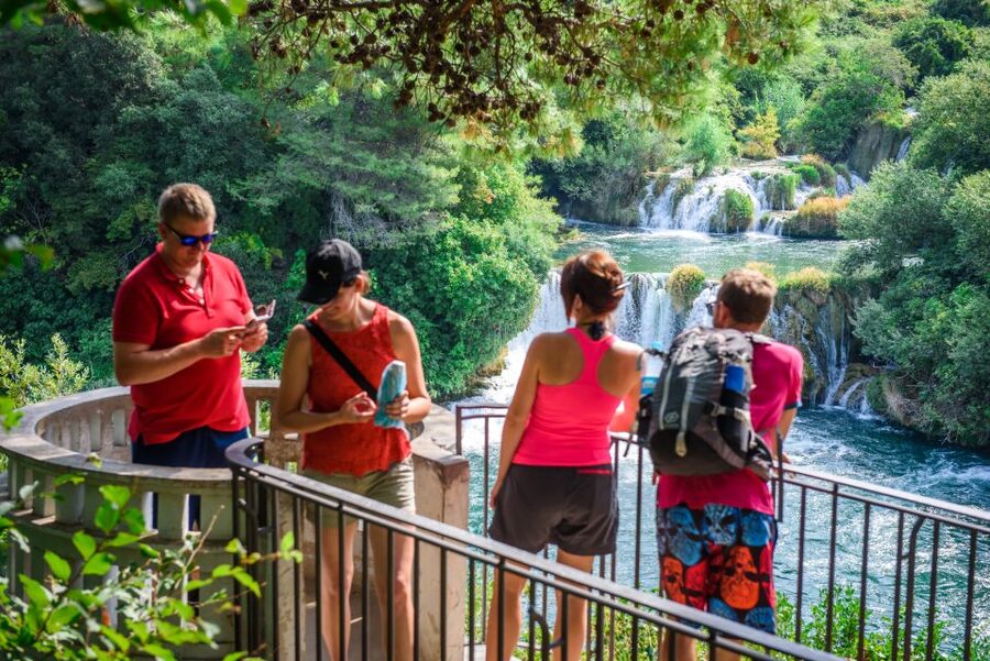 Split/Trogir: Krka National Park Day Trip with Wine Tasting - Walking through Skradinski Buk