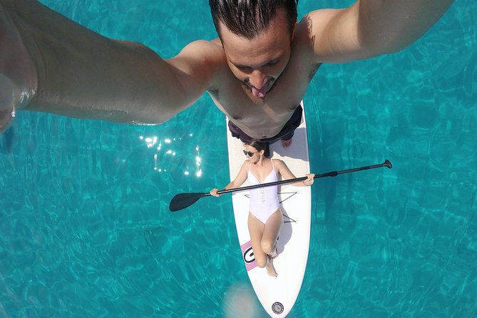Stand Up Paddle (SUP) board rental - Learning the basics in the sheltered bay
