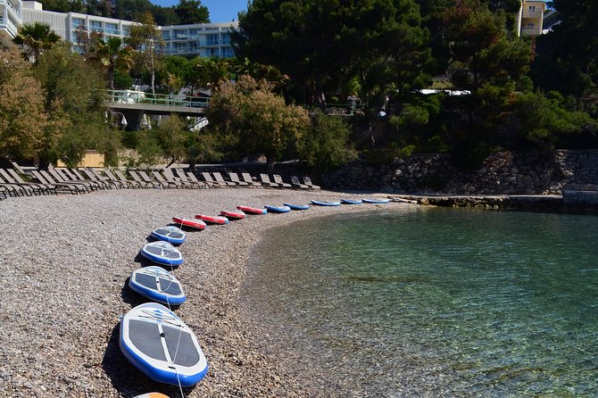Stand Up Paddle (SUP) board rental - Choosing a coastal paddle toward the cliffs