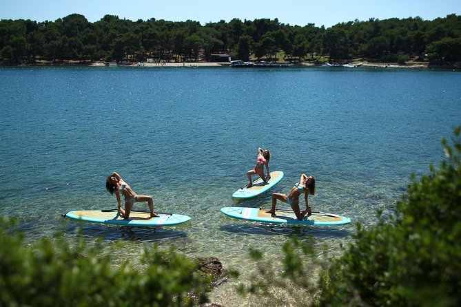 SUP Yoga in Pula: Flow on Water - A supportive class for yoga beginners