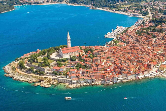 Vrsar, Lim Fjord and Rovinj Day Tour by Boat with Drinks - Old streets, sea-level houses, and a possible swim