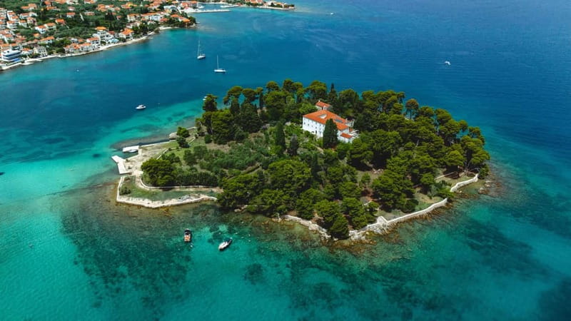 Zadar: 3 Islands Snorkeling Cruise with Prosecco - Ošljak, the one-hour island stop