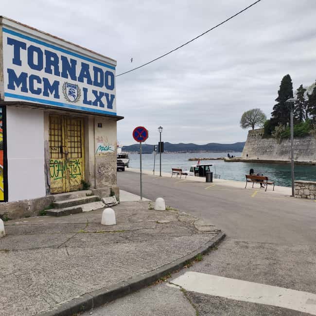 Zadar: 3-Stop Blue Lagoon & Snorkeling Cruise with Drinks - Stop two: a small Dalmatian village
