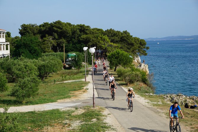 Zadar Guided Electric Bike Tour - Riding past the Sphinx