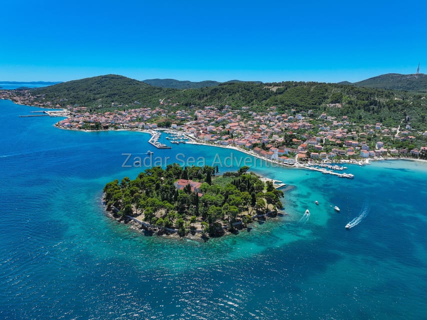 Zadar: Island Hopping Speedboat Adventure with Aperol Spritz - Stop three: choose between a bay and a fishing village