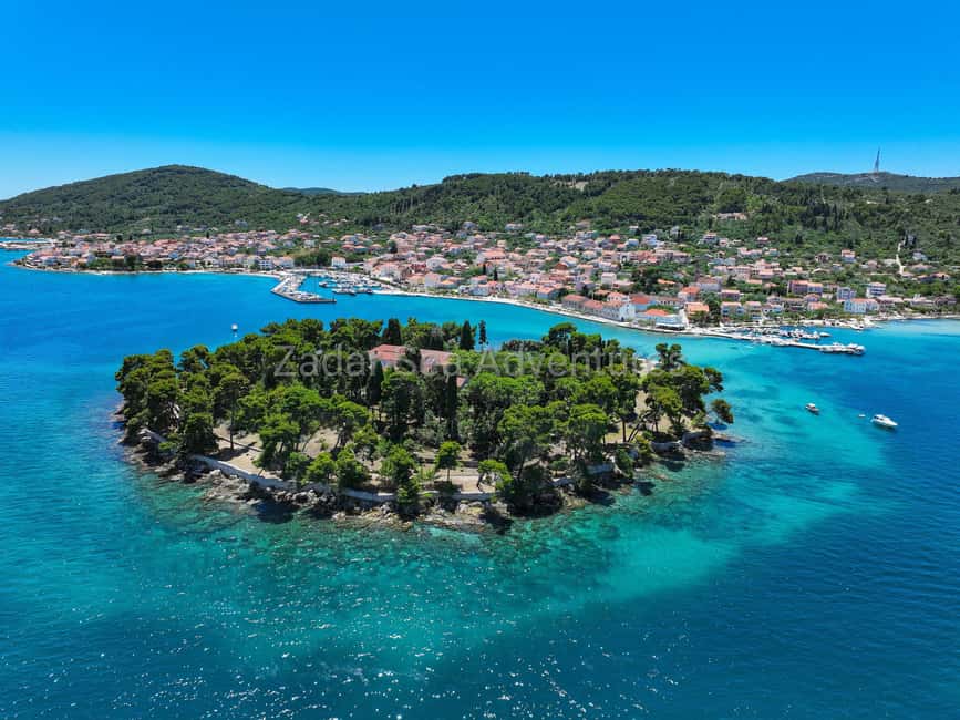 Zadar: Island Hopping Speedboat Adventure with Aperol Spritz - Stop one: a quiet cove for swimming and snorkeling