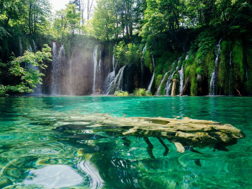 Zadar: Plitvice Lakes Guided Day Tour with Tickets - Four hours on the wooden paths