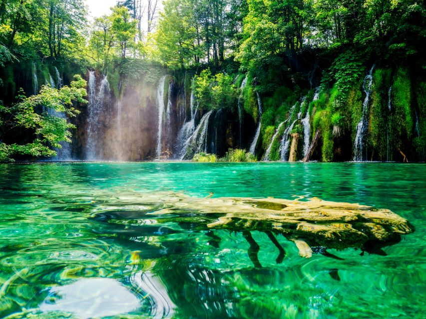 Zadar: Plitvice Lakes with Boat Ride and Zadar Old Town Tour - The electric train and return journey