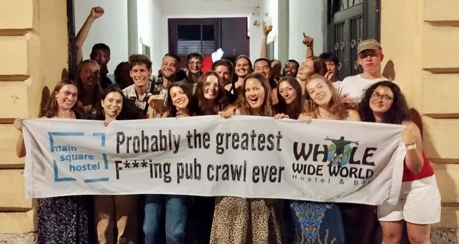 Zagreb: Pub Crawl, 1-Hour of Unlimited Drinks, & Club Entry - Walking from the hostel to two bars